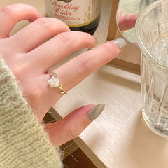 Anillo abierto de camelia hembra 