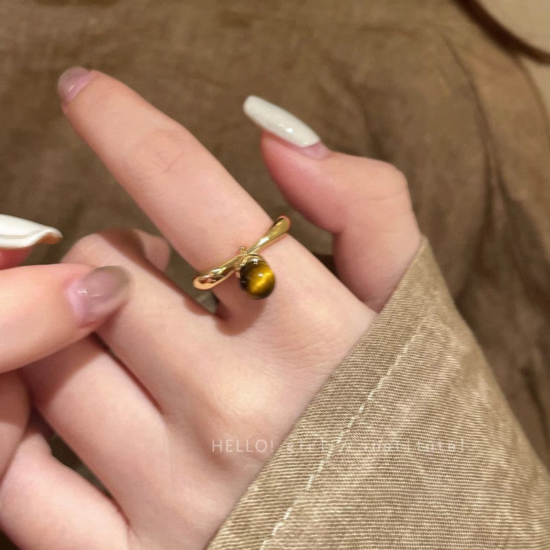 Anillo Maillard vintage de oro con girasol y ojo de tigre 