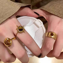 Anillo Maillard vintage de oro con girasol y ojo de tigre 