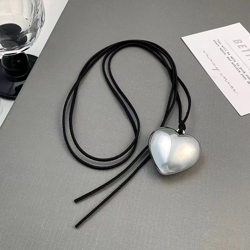 Collar negro de mujer con cadena de suéter larga en forma de U 