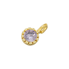 Colgantes pequeños hechos a mano con diamantes de colores y incrustaciones de cobre. 