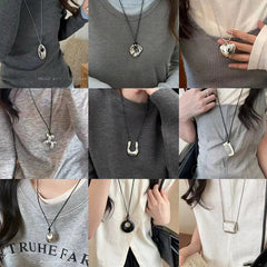Collar negro de mujer con cadena de suéter larga en forma de U 