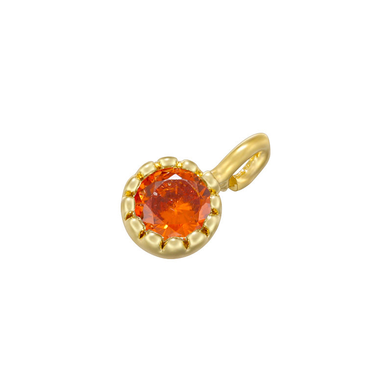 Colgantes pequeños hechos a mano con diamantes de colores y incrustaciones de cobre. 