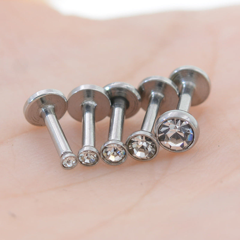 Perno de labio con perforación de bolsa de acero inoxidable de 1,5-4 mm y circonita de 1,2 mm con perforación para nariz y oreja. 