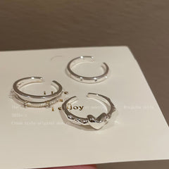 Anillo de amor de doble apilado con apertura ajustable para el dedo índice. 