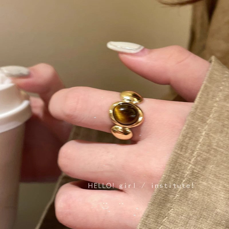 Anillo Maillard vintage de oro con girasol y ojo de tigre 