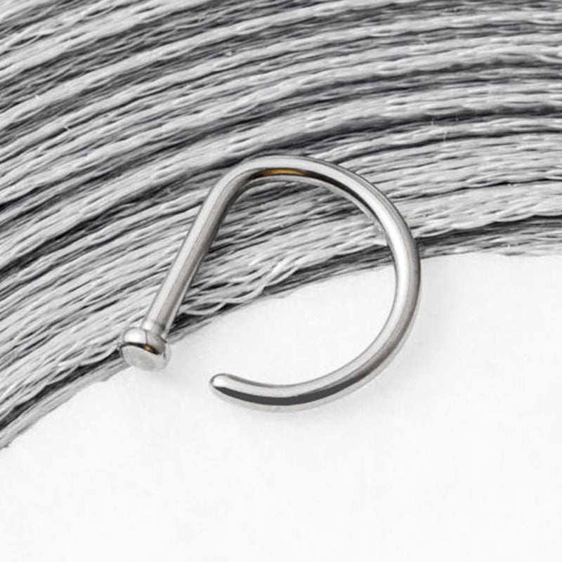 Anillo nasal falso perforado de acero inoxidable 