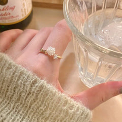 Anillo abierto de camelia hembra 
