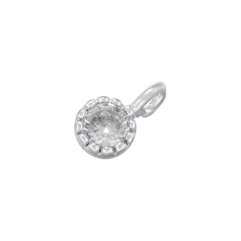Colgantes pequeños hechos a mano con diamantes de colores y incrustaciones de cobre. 