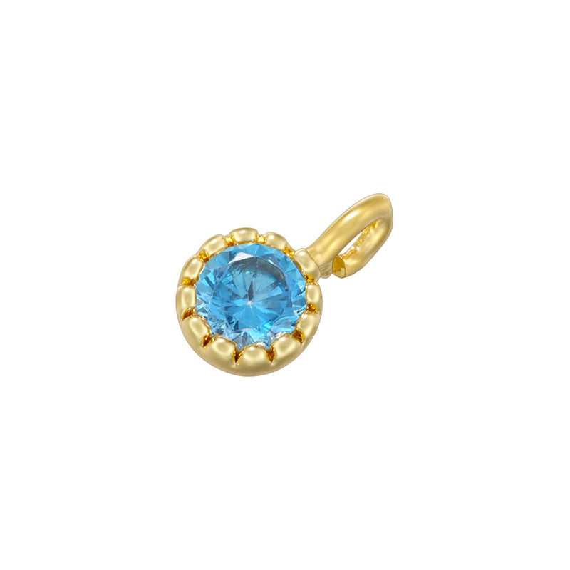 Colgantes pequeños hechos a mano con diamantes de colores y incrustaciones de cobre. 