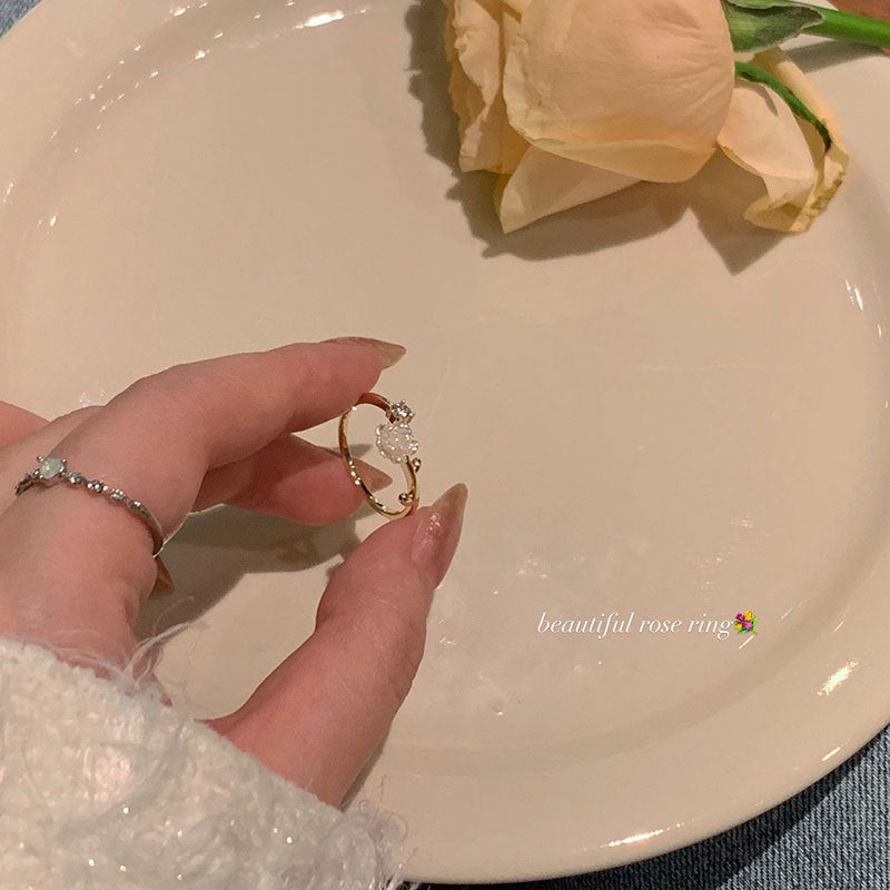 Anillo abierto de camelia hembra 