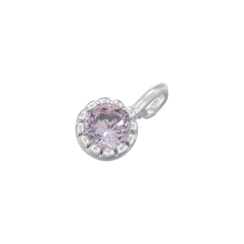 Colgantes pequeños hechos a mano con diamantes de colores y incrustaciones de cobre. 