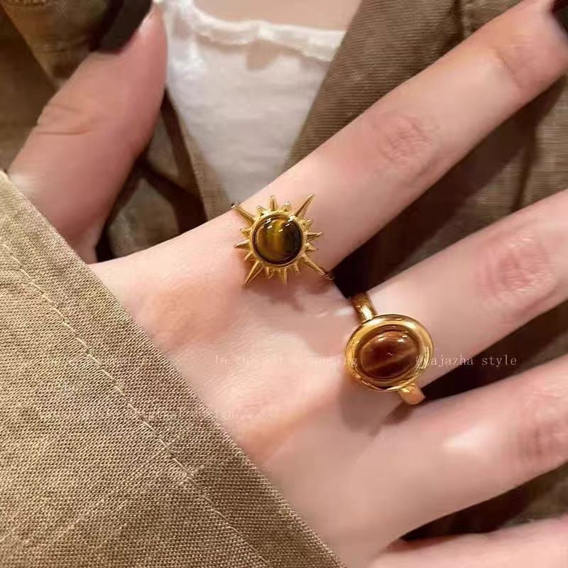 Anillo Maillard vintage de oro con girasol y ojo de tigre 