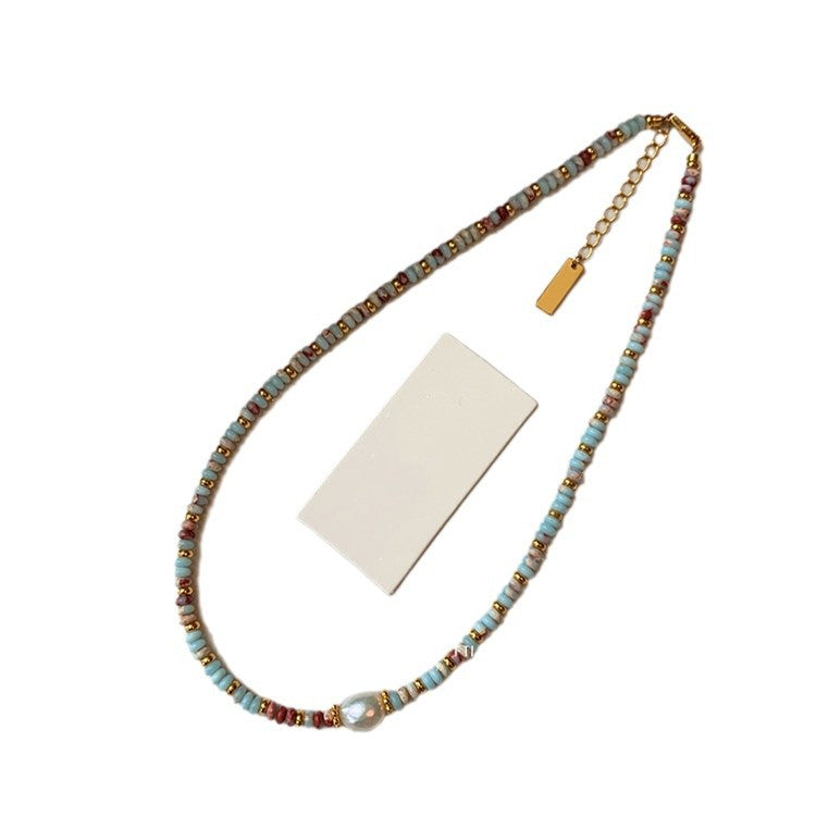 Collar de cuentas de perlas de agua dulce de color piedra natural con cadena de clavícula apilada 