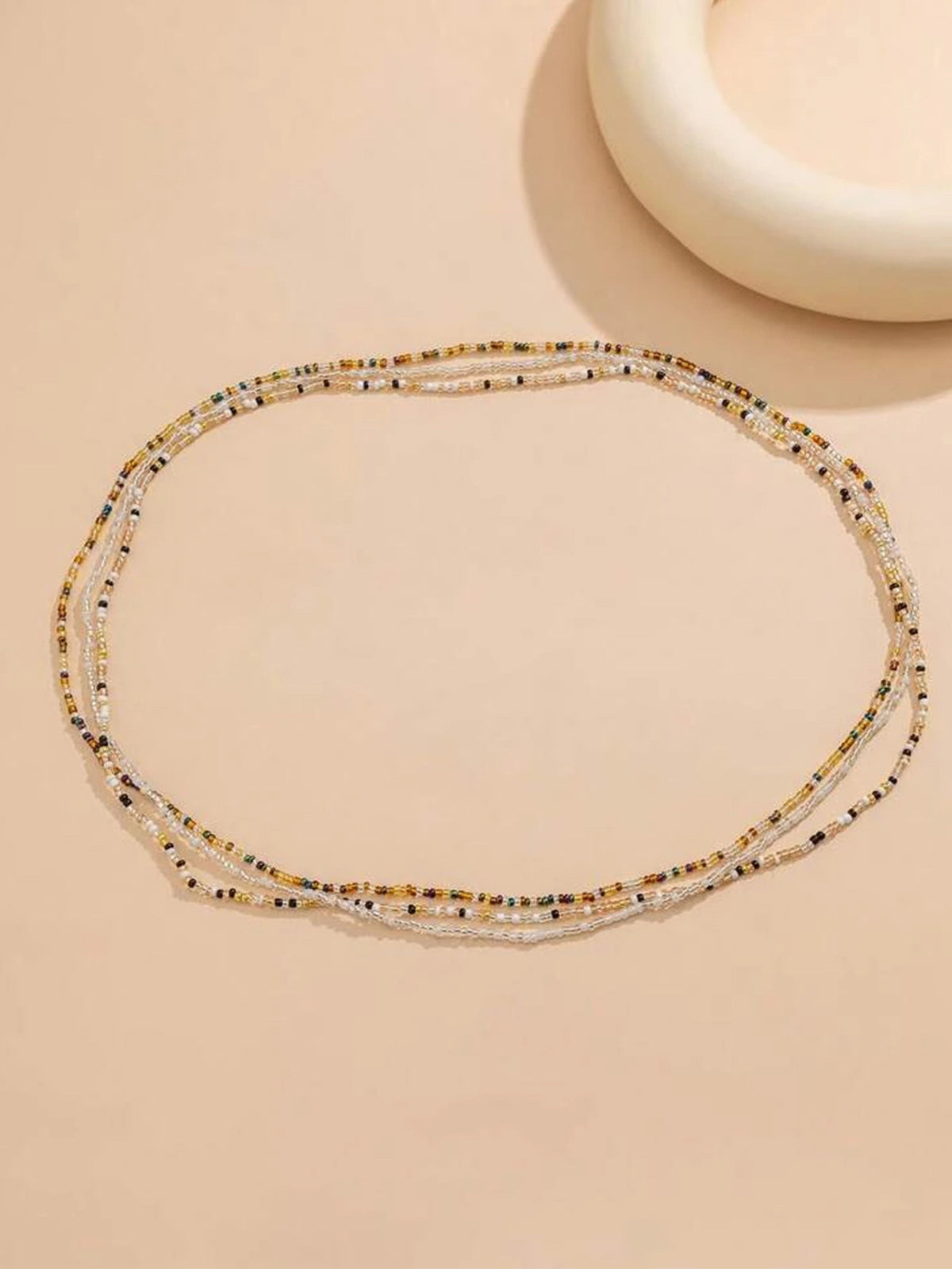 Conjunto de cadena para la cintura con cuentas de arroz de tres colores variados, versátil y a la moda, para mujer. 