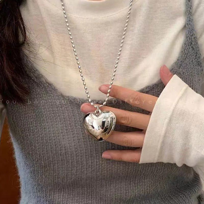 Collar negro de mujer con cadena de suéter larga en forma de U 
